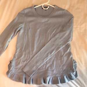Light blue ruffled sweater